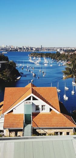 Houses by sea in city