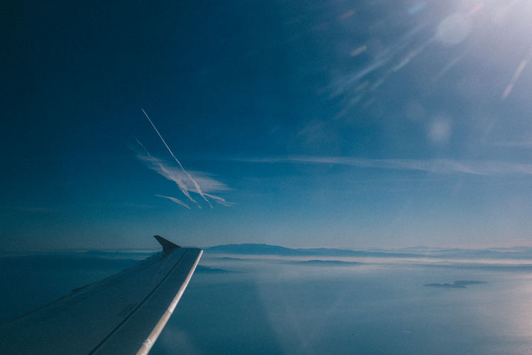 Scenic view of sea against blue sky