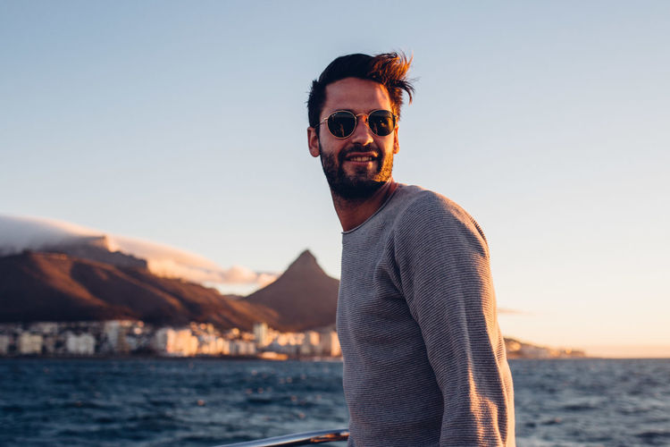 Cape Town Enjoying The Sun Freedom Friends Happiness Laughing Memories Summertime Traveling Youth Boat Boat Cruise Enjoying Life Goldenhour Good Mood Horizon Over Water Ocean Portrait Sailing Boat Sailor Summer Sunset Sunset Cruise Travel Destinations Windy