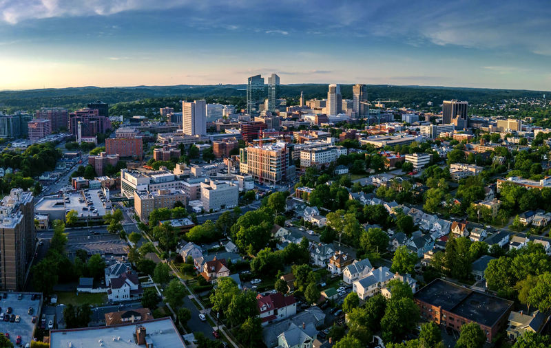 High angle view of buildings in city against sky