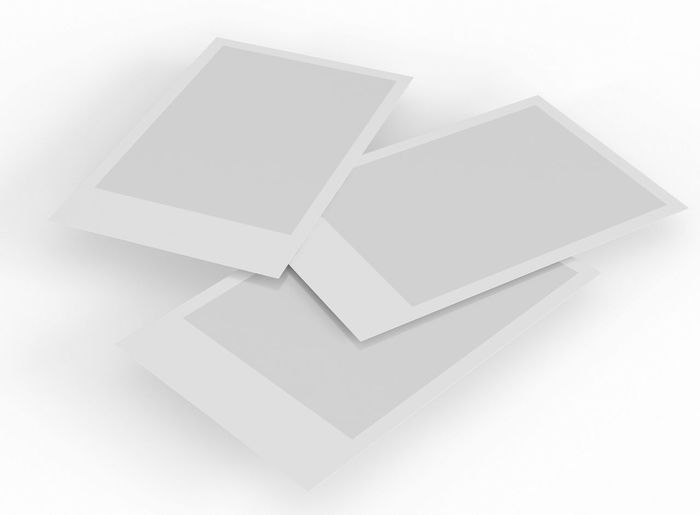 High angle view of papers over white background