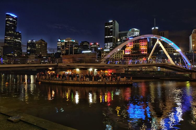 Illuminated buildings in city at night, melbourne australia 