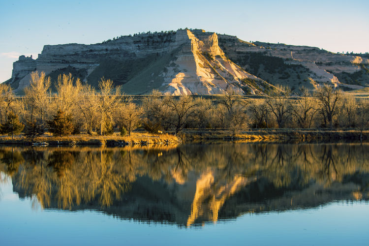 Scenic view of lake by  scotts bluff national monument 