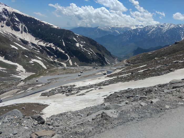 Scenic view of snowcapped mountains against sky