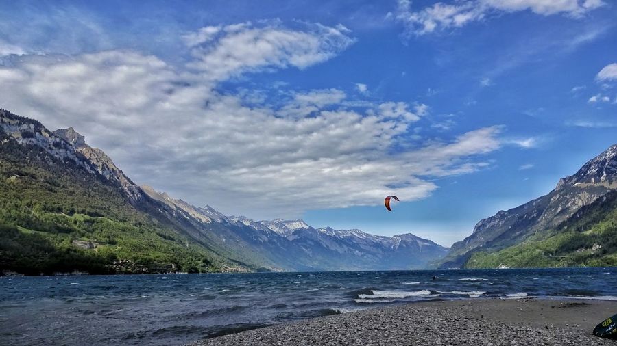 Scenic view of lake brienz against sky