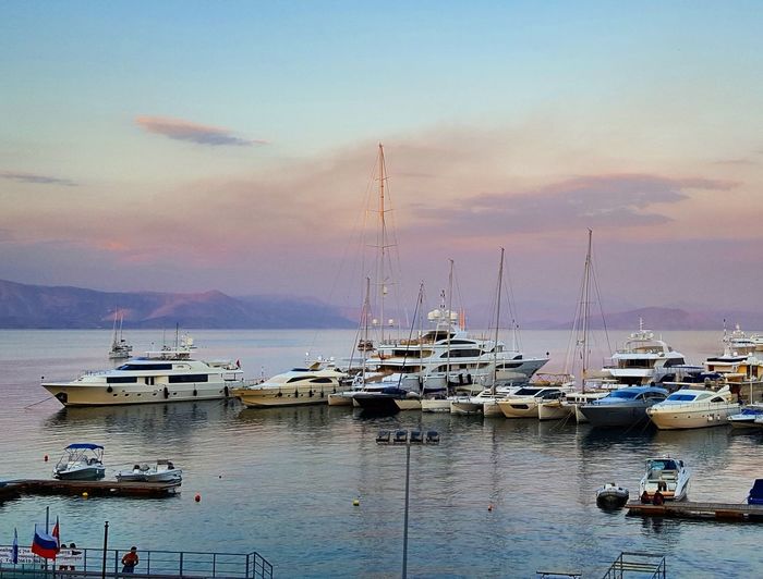 View of boats moored in calm sea