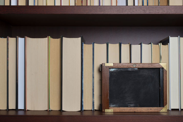 Close-up of books in shelf