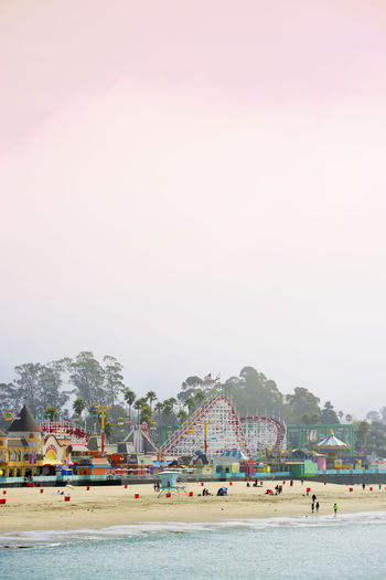Usa, california, santa cruz, amusement park on sandy beach seen from municipal wharf