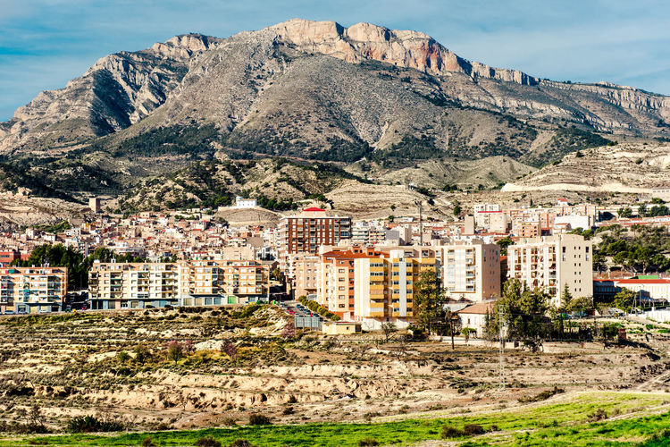 Buildings against mountain at jijona