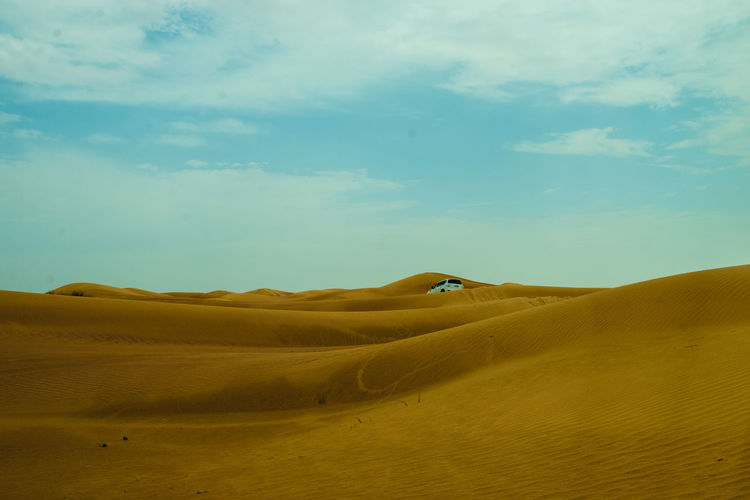 Scenic view of desert against sky