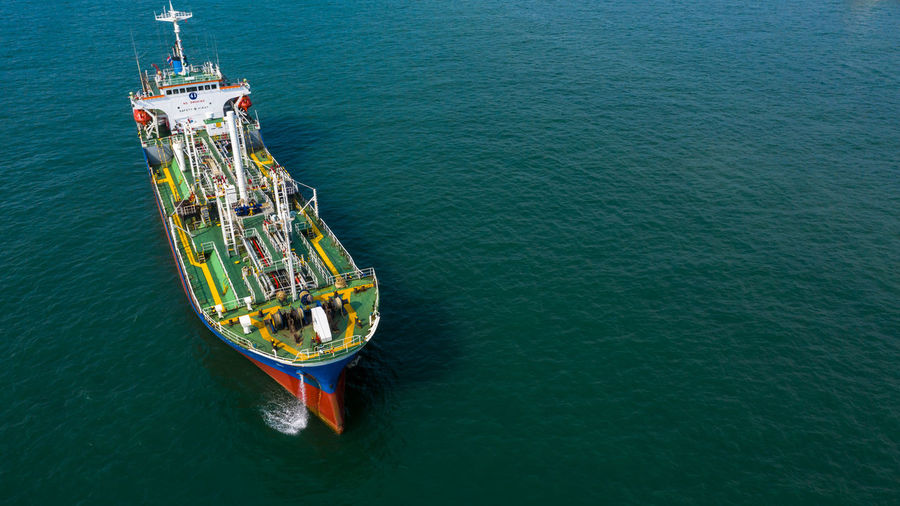 Aerial view oil and gas tanker petrochemical offshore in open sea, refinery industry cargo ship, 