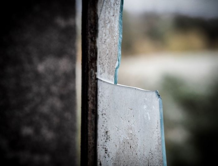 Close-up of broken window