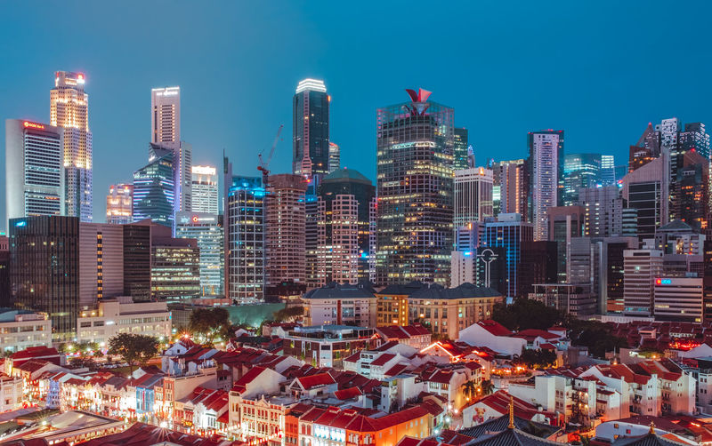 Illuminated buildings in city at night