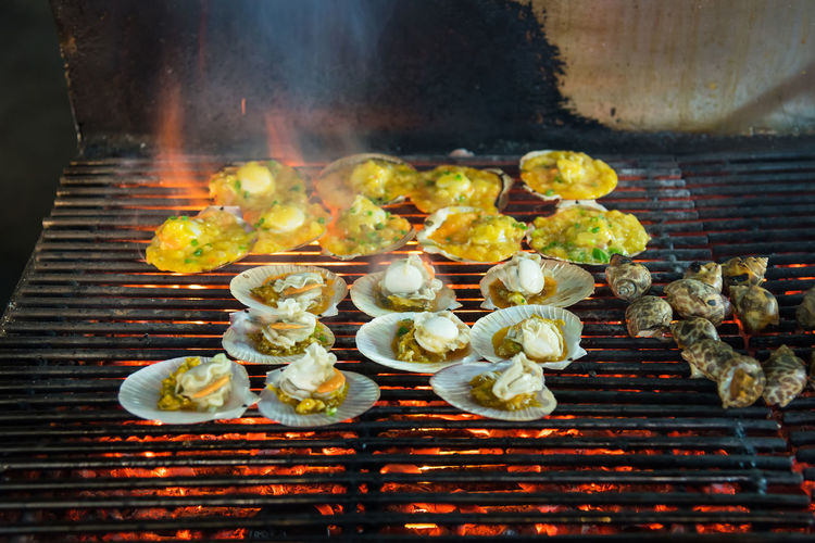 High angle view of food being cooked on barbeque grill