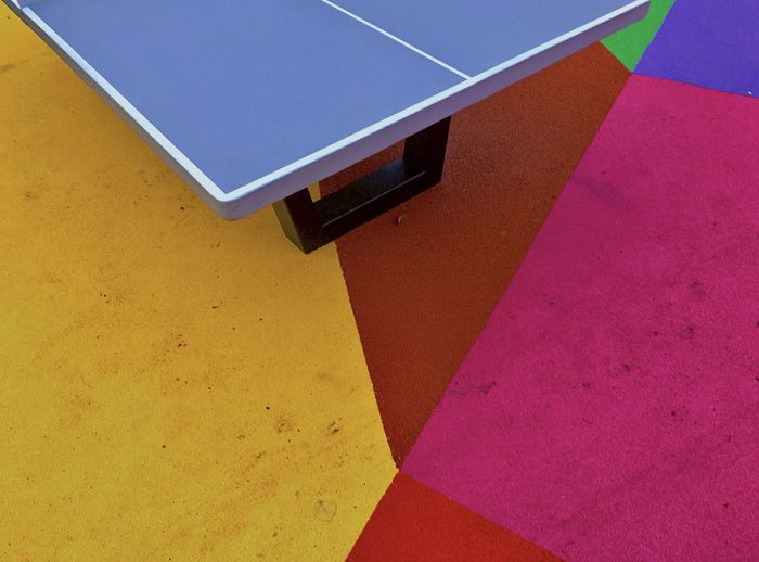 High angle view of multi colored umbrella on table