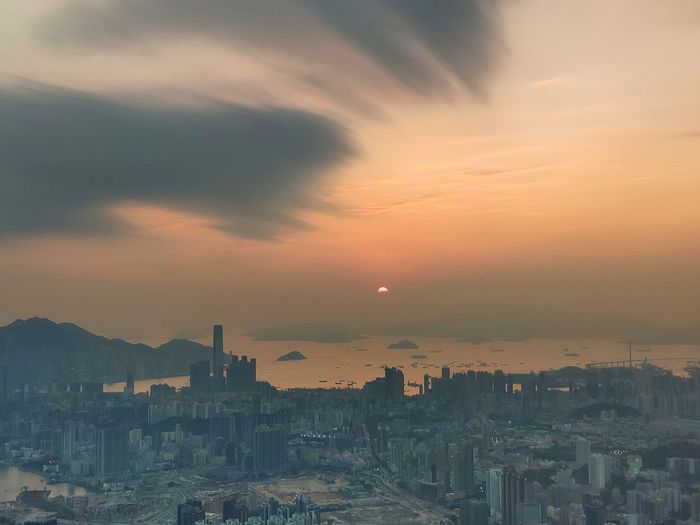 High angle view of townscape against romantic sky at sunset