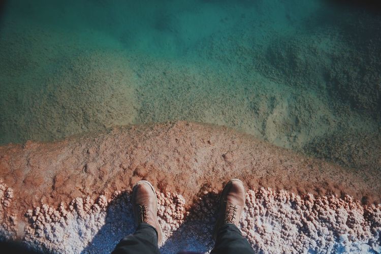 Low section of person on beach
