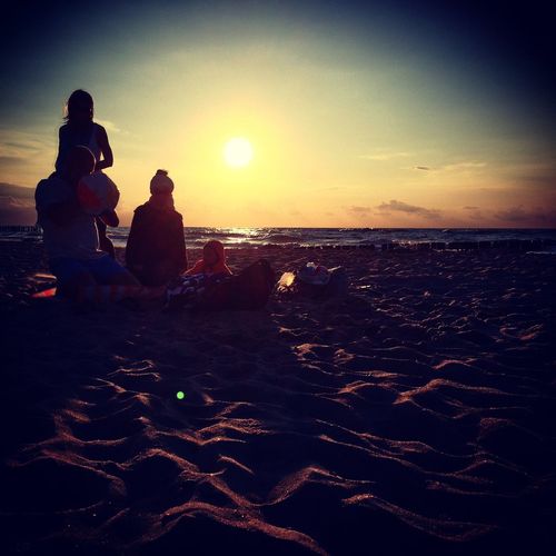 Scenic view of sea at sunset