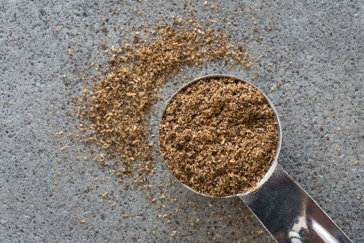 High angle view of spice in teaspoon