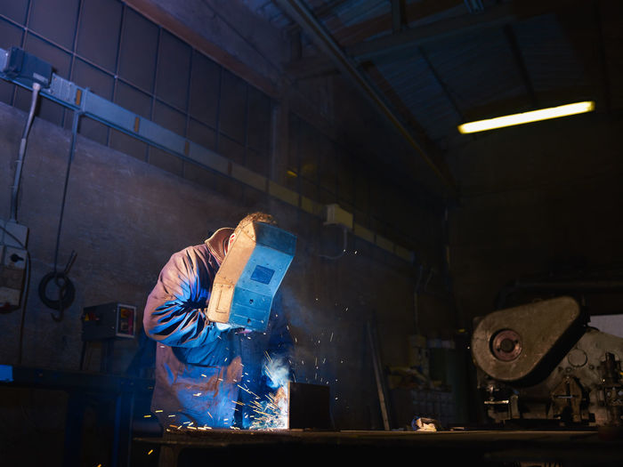 Man welding in factory