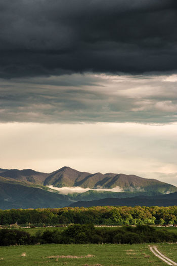 Scenic view of mountains against sky during sunset