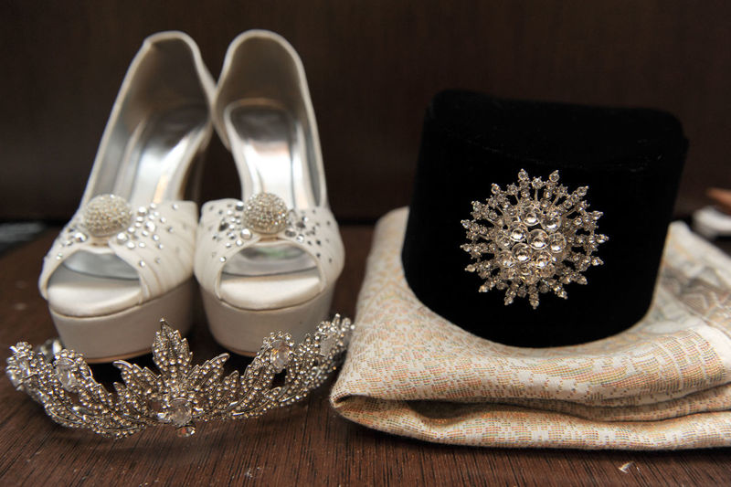 Close-up of wedding accessories on table