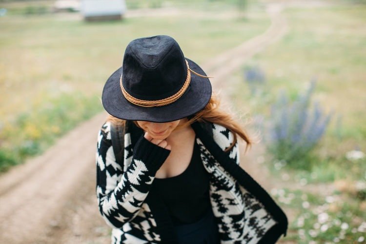 Close-up of woman wearing hat