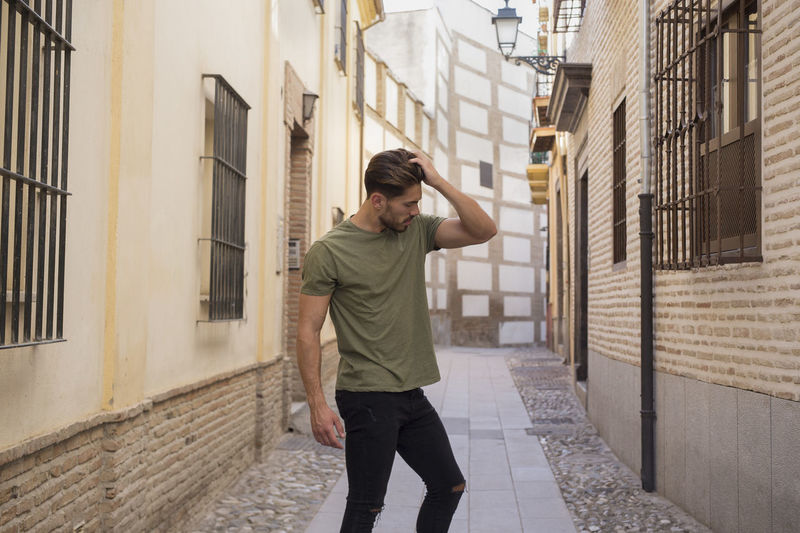 Man posing on a street