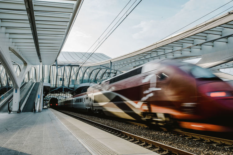 Train on railroad station platform against sky