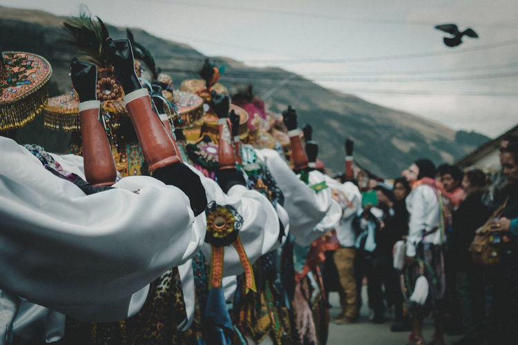 People in costume performing during festival