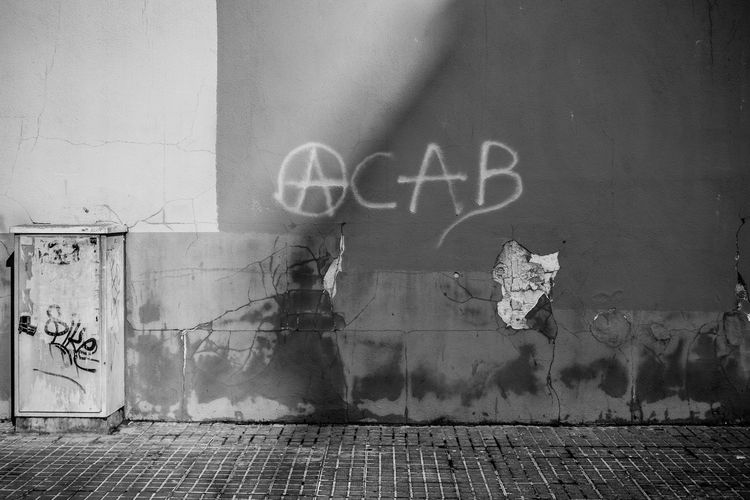 Close-up of graffiti on wall