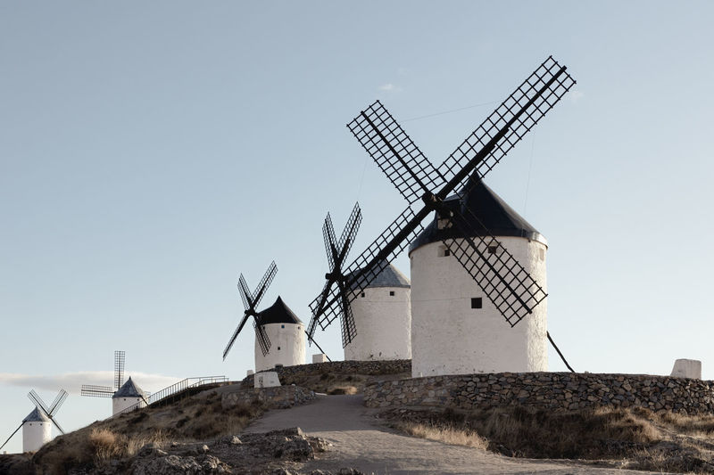 Group of ancient windmills in the town of consuegra spain , on the route of the don quixote  mills