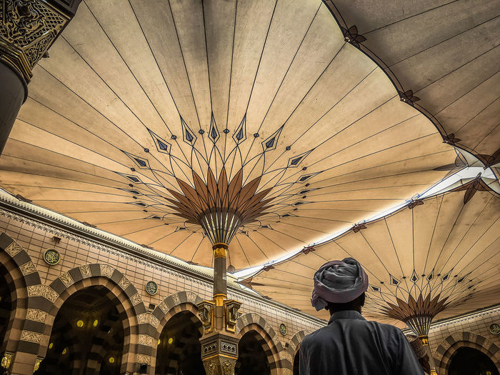 Rear view of man at al-masjid an-nabawi mosque