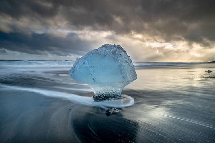 Turquoise icebergs ii black sand beach-iceland 