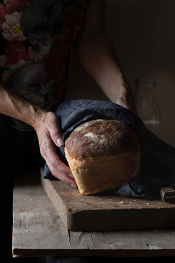 Cropped unrecognizable person preparing a milk bread brioche  person