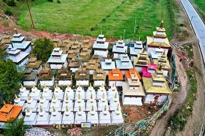 High angle view of multi colored houses on field