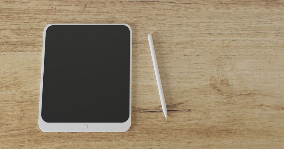 High angle view of smart phone on table