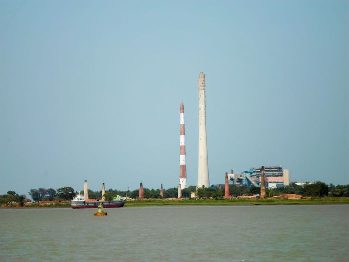 View of factory against clear sky