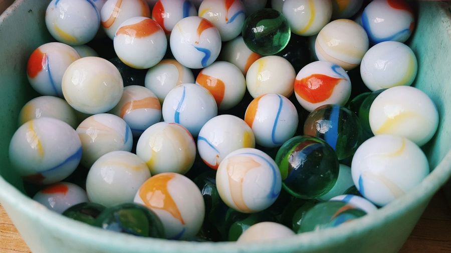 Close-up of marbles in bowl