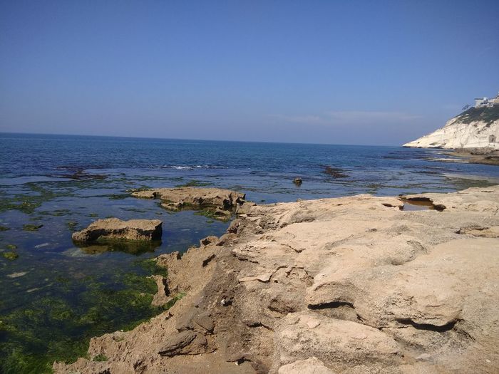 Scenic view of sea against clear sky