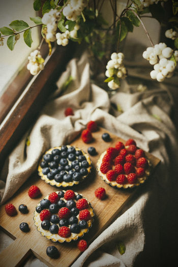 Close-up of tartelettes with berries on table