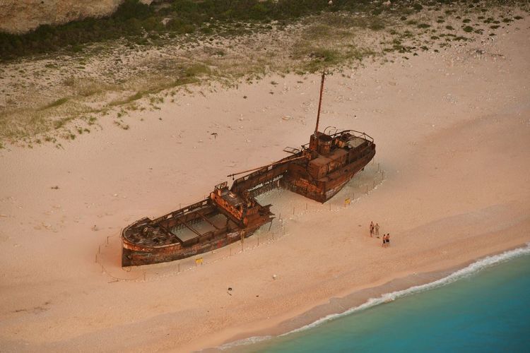 High angle view of rusty ship on beach