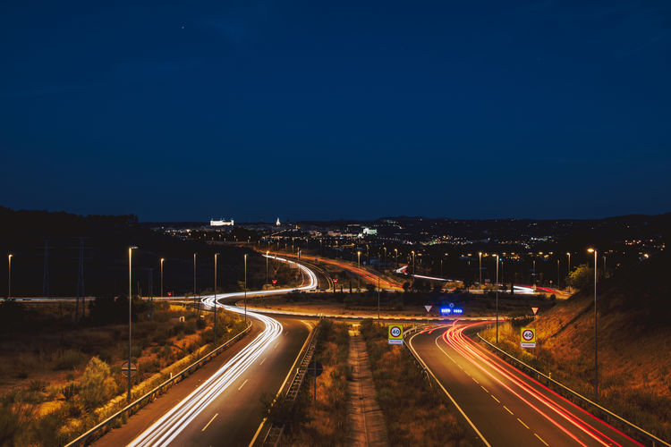Car light trails in the city of toledo. creative night photography