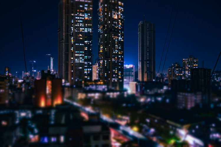 High rise night skyline tilt shift