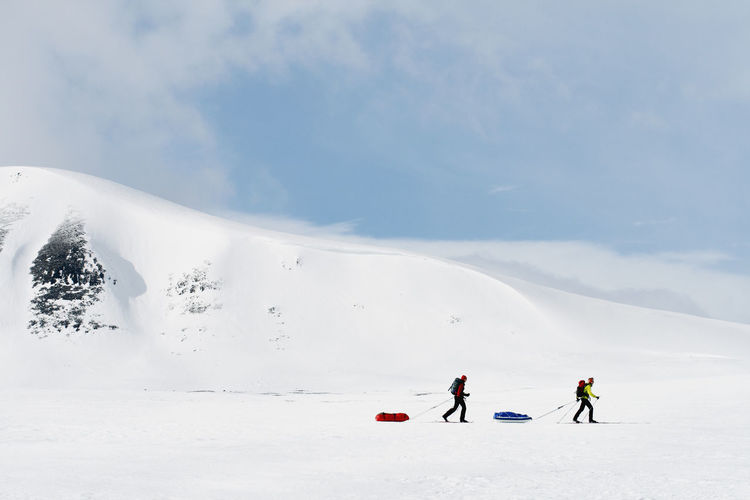 People skiing, sarek national park, lapland, sweden
