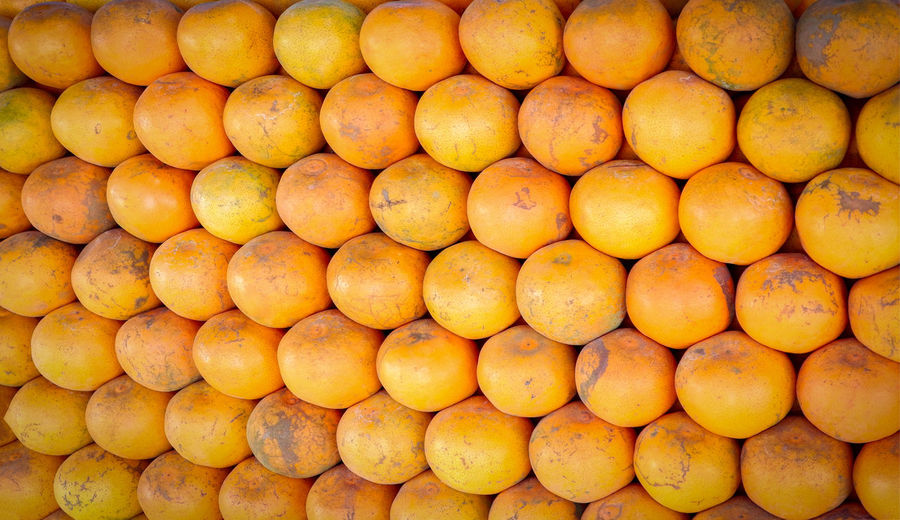 Full frame shot of orange for sale in market