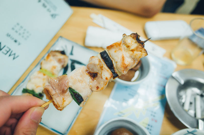 Close-up of hand holding food