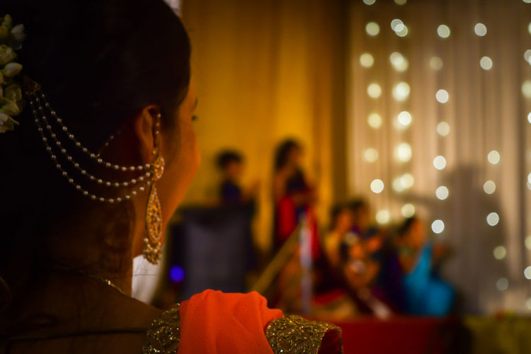 Rear view of bride during wedding ceremony