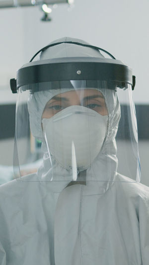 Rear view of woman wearing mask