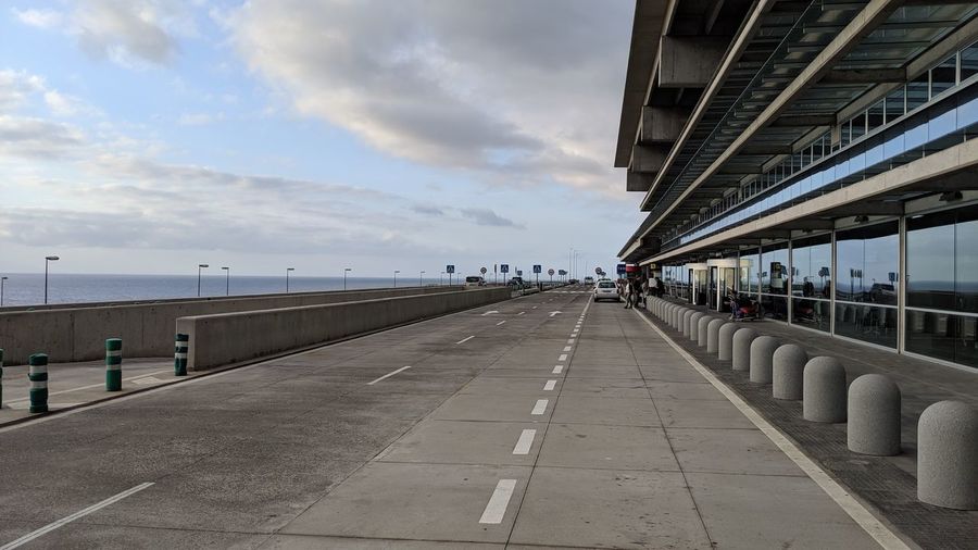 View of bridge against cloudy sky